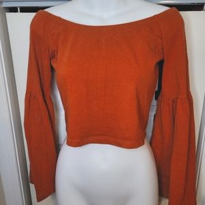 Burnt orange bell sleeve crop top
